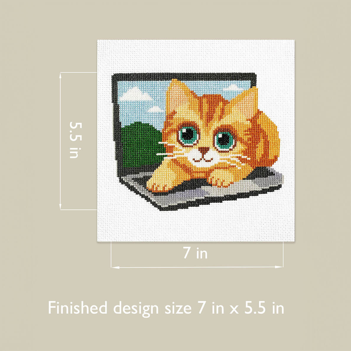 Cross-stitched design of a cat on a laptop with dimensions indicated.
