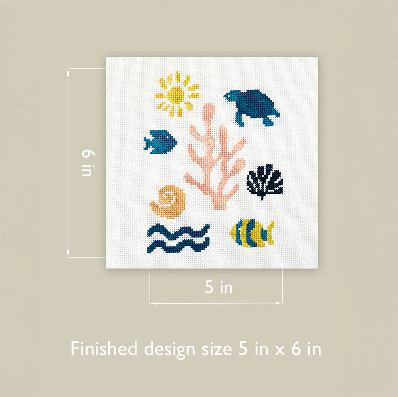 Cross-stitch pattern with sea-themed elements on a beige background, finished size diagram, 5 by 6 inches.